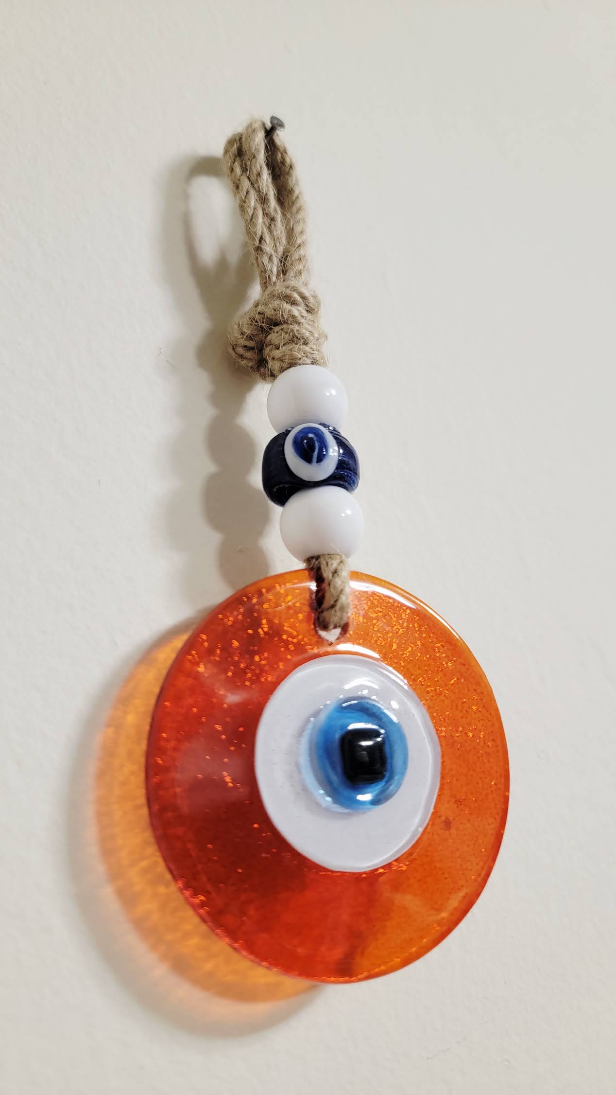 Evil Eye Wall Hanging, Handmade Glass Home Decor, Clear Orange Fusion 7 Inch