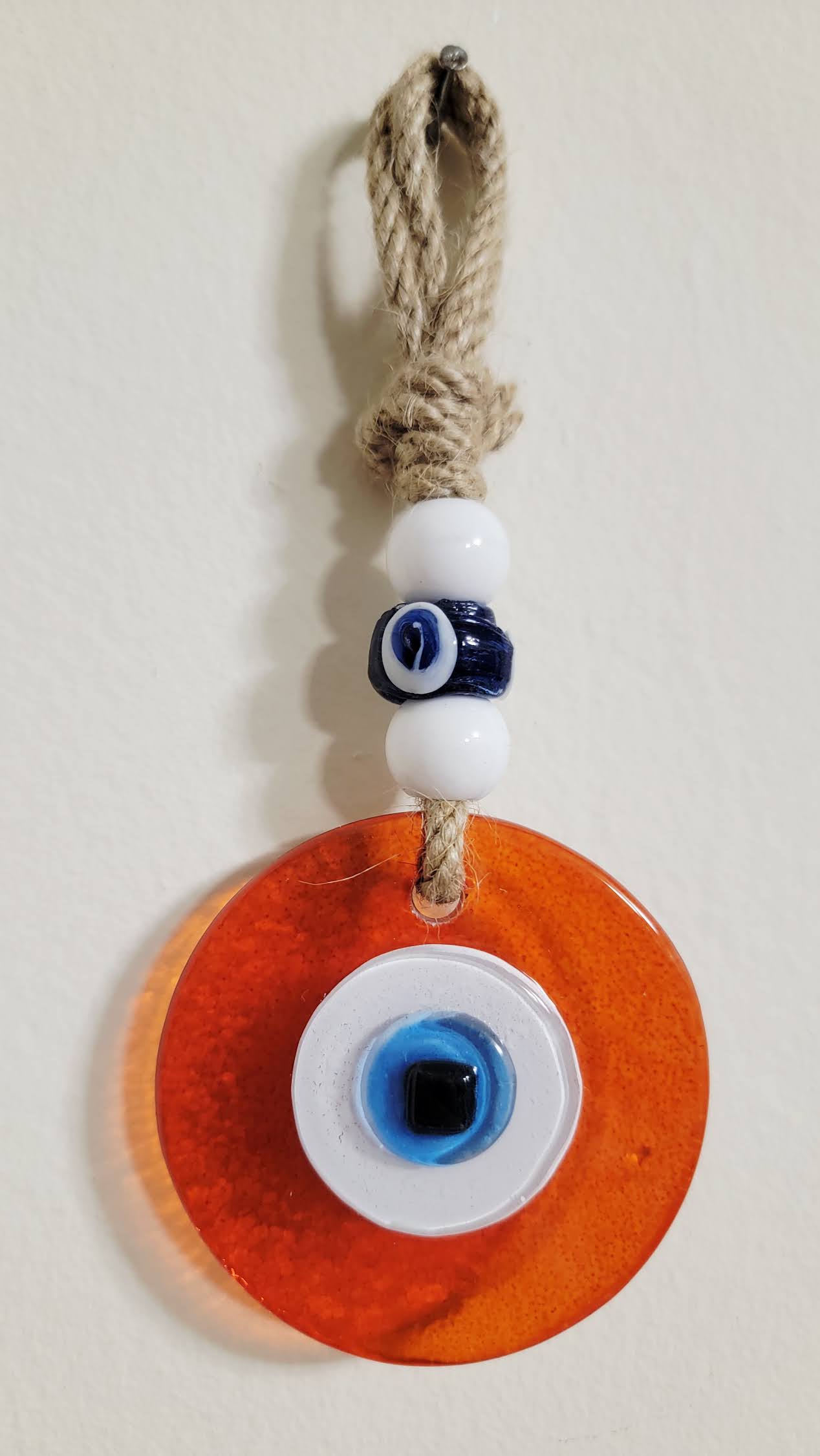 Evil Eye Wall Hanging, Handmade Glass Home Decor, Clear Orange Fusion 7 Inch