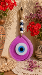 Jumbo pink hand blown glass evil eye wall hanging with beads